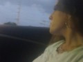 Milf smoking cigarettes while in passenger seat in vehicle