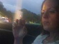 Milf smoking cigarettes while in passenger seat in vehicle