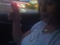 Milf smoking cigarettes while in passenger seat in vehicle