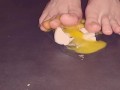 Egg gets crushed by barefeet Giantess