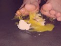 Egg gets crushed by barefeet Giantess
