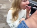 Pretty woman gave a public blowjob to a stranger in the parking lot