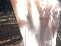 Exhibitionist hippie dancing naked in the woods