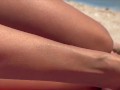 15 milf Sneaky side HJ on public beach