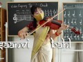 Indian Teacher play Violin Lessons in her class room