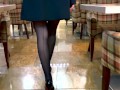 Girl putting on stockings right in the restaurant—bold and unapologetic