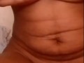 Ebony babe Kiraah rubbing her juicy Ebony pussy for me