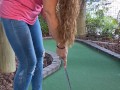 Pretty girl golfing and she completely miss the shot