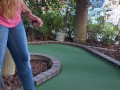 Pretty girl golfing and she completely miss the shot