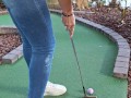 Pretty girl golfing in tight ripped jeans sfw