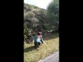Trashy Kiwi MILF pisses on roadside with oncoming traffic