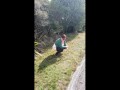 Trashy Kiwi MILF pisses on roadside with oncoming traffic