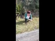 Trashy Kiwi MILF pisses on roadside with oncoming traffic