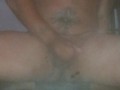 Hot guy squirts a huge cum load in public adult glory hole while people watch through the holes