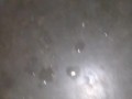 Hot guy squirts a huge cum load in public adult glory hole while people watch through the holes