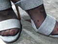 Trying on sandals on fetish feet