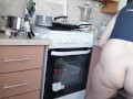 Sexy naked wife prepares food in the kitchen. Hairy brunette hair, big ass, big tits.