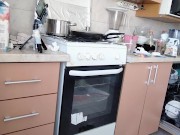 Sexy naked wife prepares food in the kitchen. Hairy brunette hair, big ass, big tits.