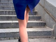 Girl wearing nude nylons stockings and high heels