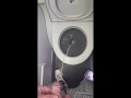 Taking a piss on a plane at a mile high