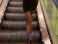A girl wearing black nylons stockings and high heels