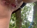 Peeing in the woods close-up