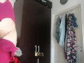 Sexy wife has fun trying on clothes and cutting them. Brunette dances naked around the house.
