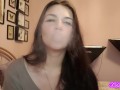 Teen latina brunette with blue eyes teases you with slow, seductive smoking