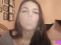 Teen latina brunette with blue eyes teases you with slow, seductive smoking