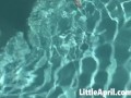 Little April fingers herself in the pool in a POV solo