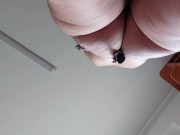 Sexy Latina nude in the kitchen. Sexy naked wife prepares food in the kitchen.