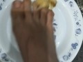 Mash the banana with my foot... Eat it, slave!