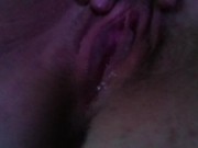 alone pussy drips wetness as fingers stroke it