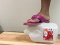 stomping on jug of water in pink hush puppy sandals 1080