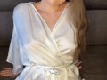 Hot wife in a dressing gown waits for her pussy lover while she's home alone