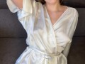 Hot wife in a dressing gown waits for her pussy lover while she's home alone