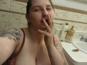 Hairy girl smoking pissing and fingering her pussy till she cums