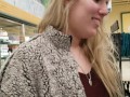 Cute girl plays with butt plug in grocery store