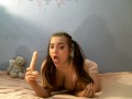 Panties in Mouth Pigtails Girl Plays With Dildo