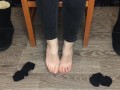 Student girl show nylon socks, boots and foot after study