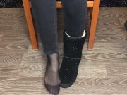 Student girl show nylon socks, boots and foot after study