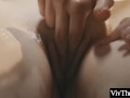 Sexy masseuse brings busty teen to orgasm by fingering her hot pussy