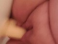 Chubby chick bounces on dildo