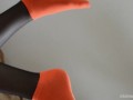 Orange cotton socks and black stockings