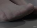 Legs in white socks on the table