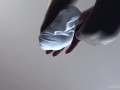 Legs in white socks on the table