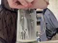 Sexy milf in lingerie squirting breastmilk into cup
