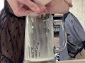 Sexy milf in lingerie squirting breastmilk into cup
