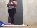 Bbw having fun at outdoor racquetball court while people play close by
