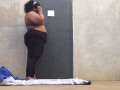 Bbw having fun at outdoor racquetball court while people play close by